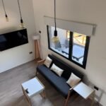 sala de estar televisor vista aerea